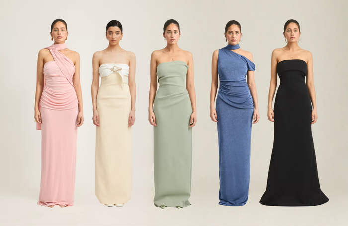 Four models wearing elegant evening dresses from BELLA n' BEAR in pink, ivory, sage and black — how to style evening dresses Australia