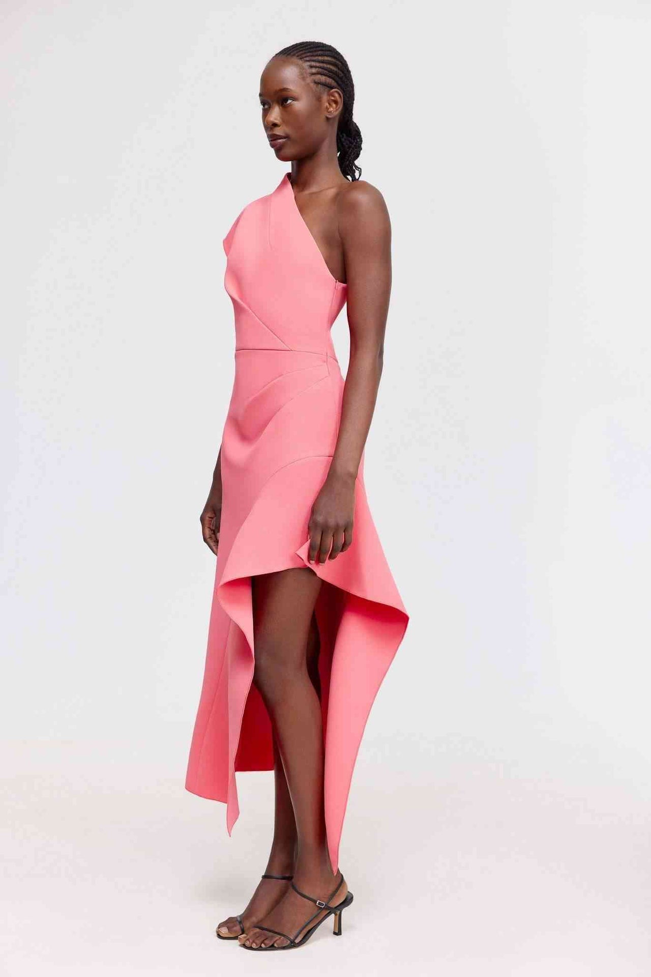 a woman in a pink Acler Eddington Midi dress poses for a picture