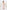 a woman in a By Johnny Edens Floral Square Peep Dress