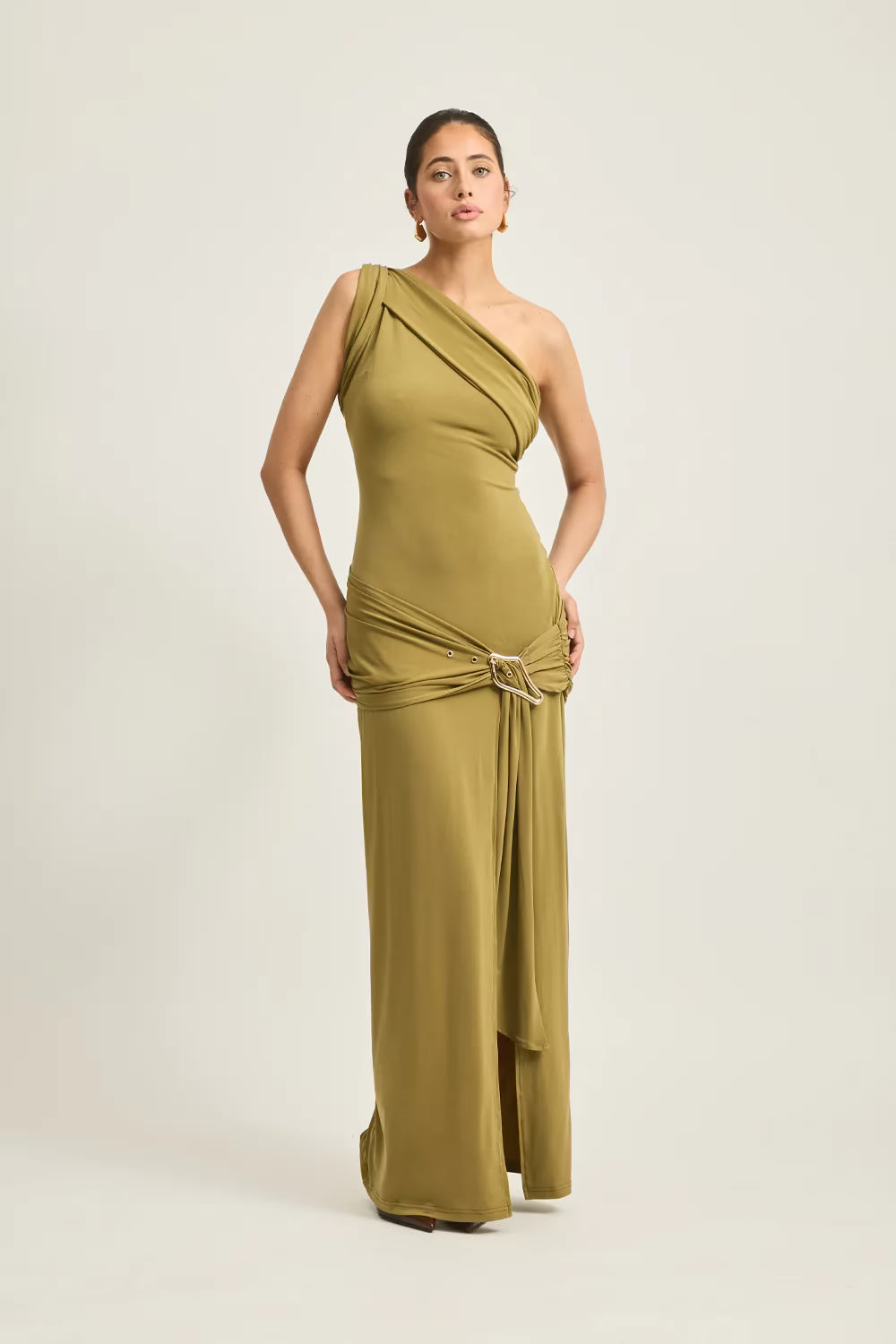 Atiyah dress in olive green, featuring a one-shoulder design and draped fabric with a side knot detail.