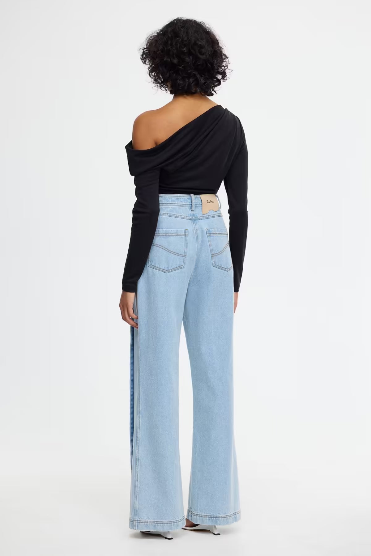 Midwash wide-leg denim jeans, back view with yoke seams