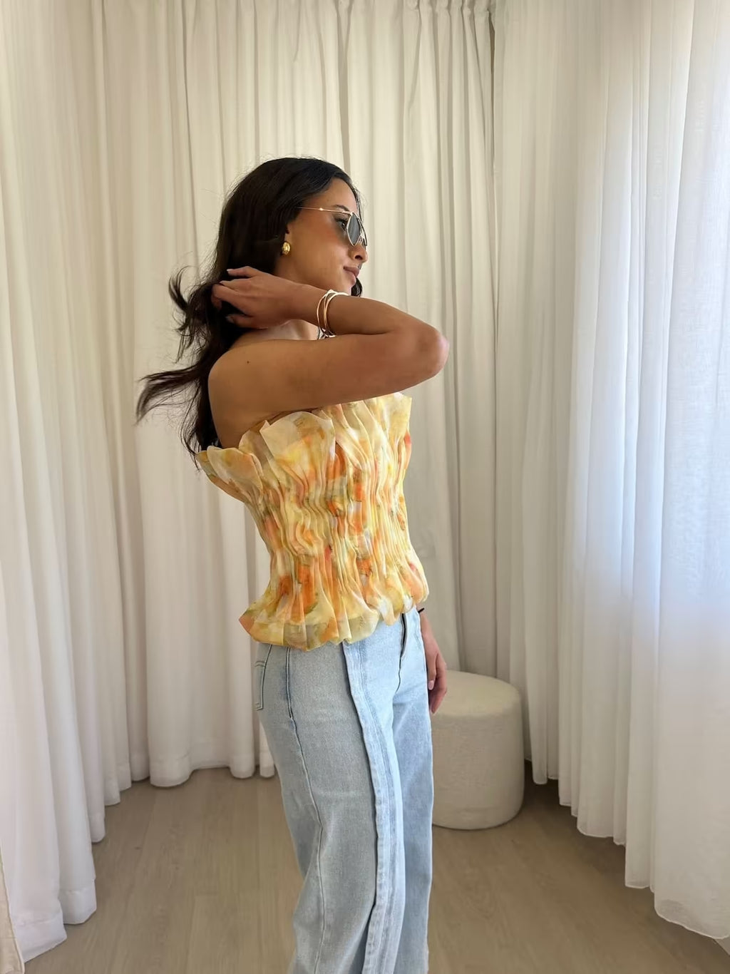 Midwash wide-leg denim jeans, back side view