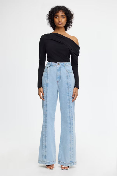 Midwash wide-leg denim jeans with button fly and belt loops