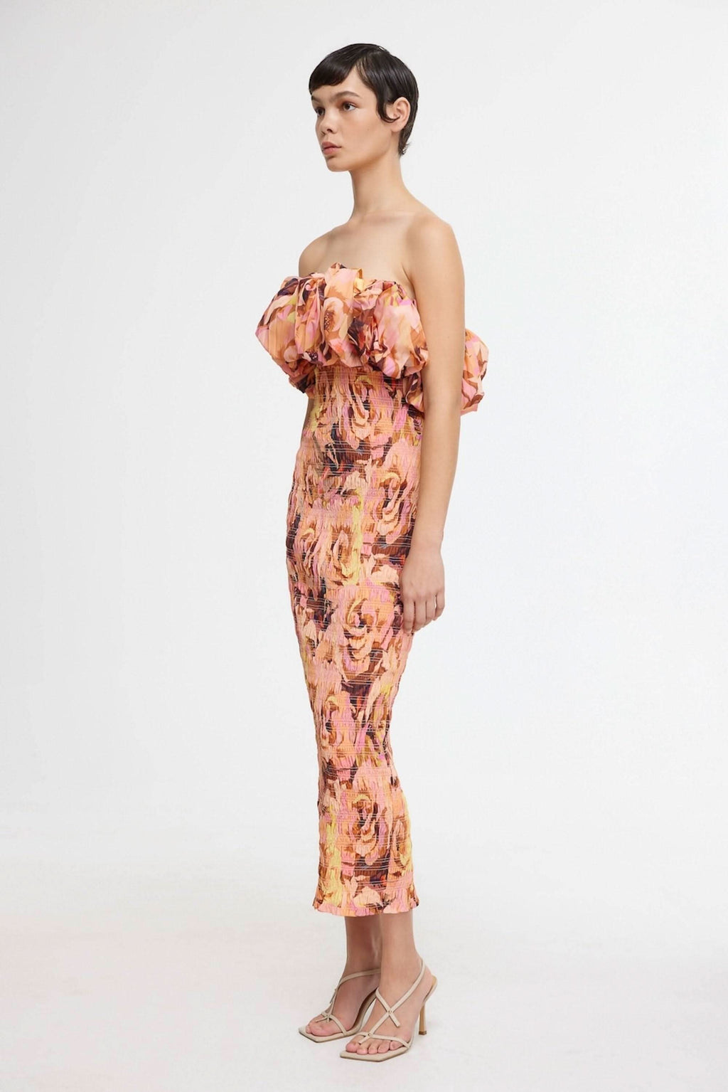 Floral midi dress with ruffled off-shoulder neckline and fitted silhouette