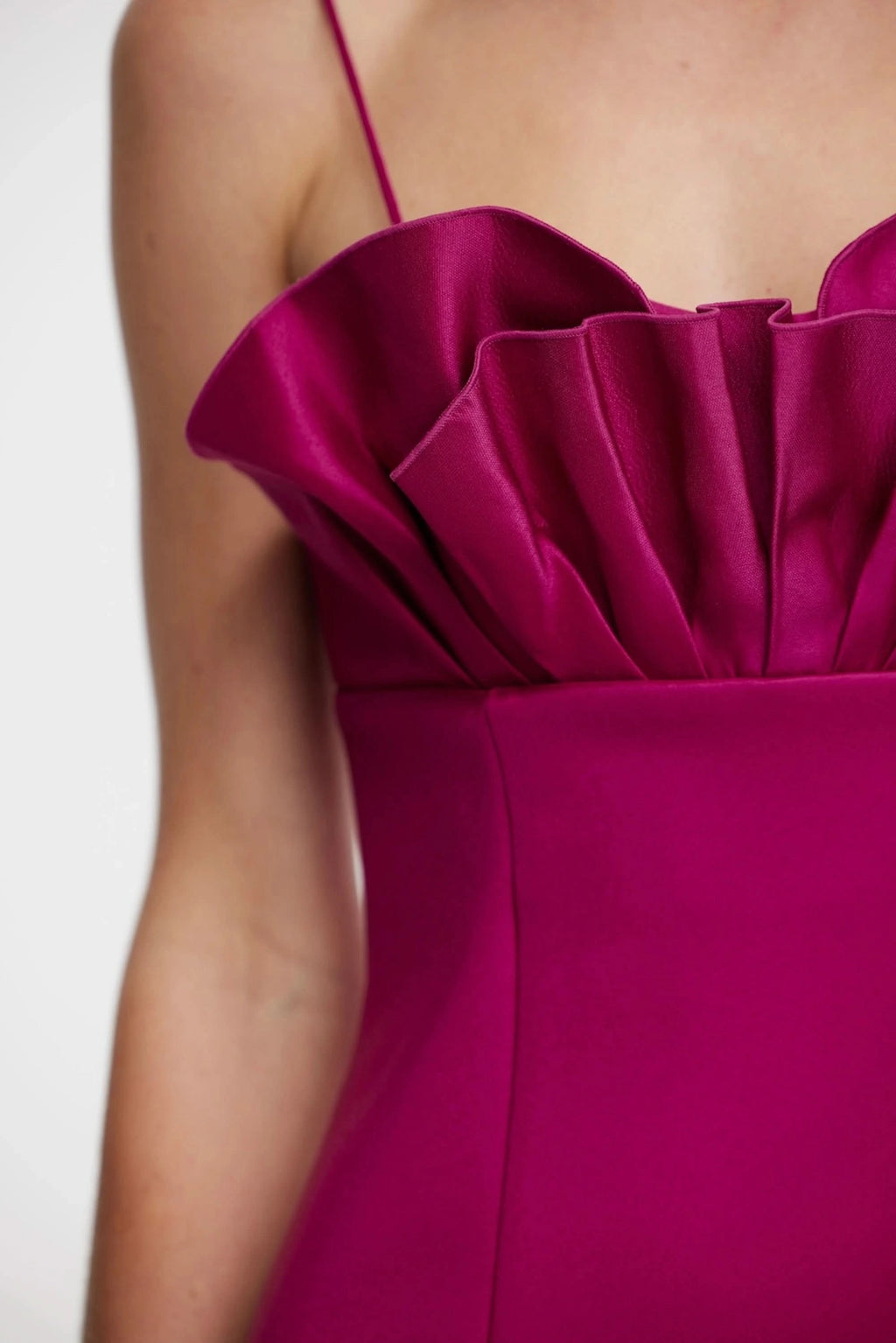 Mahina plum dress close-up: ruched bust with layered ruffle at neckline