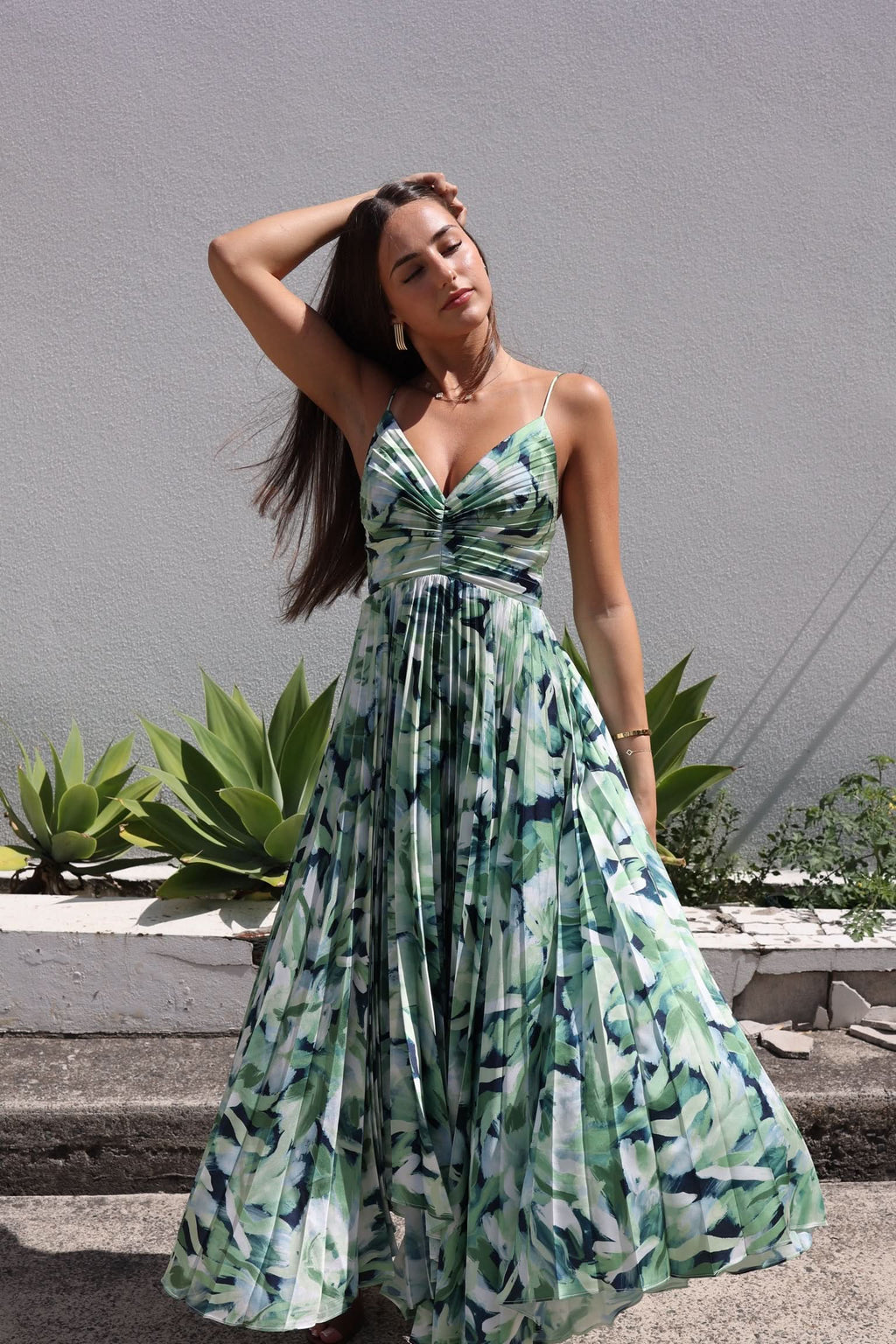 Leafy print midi dress with ruched V-neck bodice and flowing tiered skirt