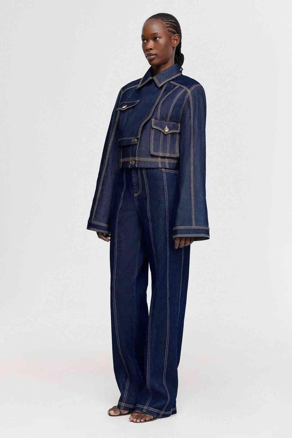 Dark indigo denim jeans with wide legs and front jeans-style pockets