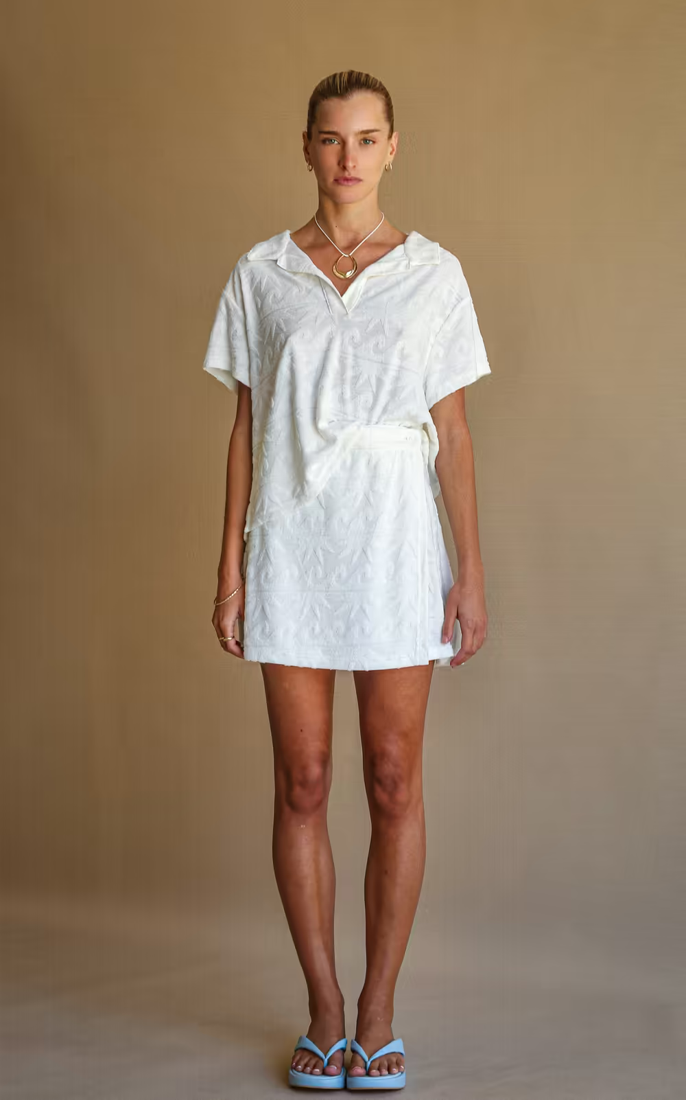 Vanilla terry wrap skirt, short A-line shape with subtle embossed pattern