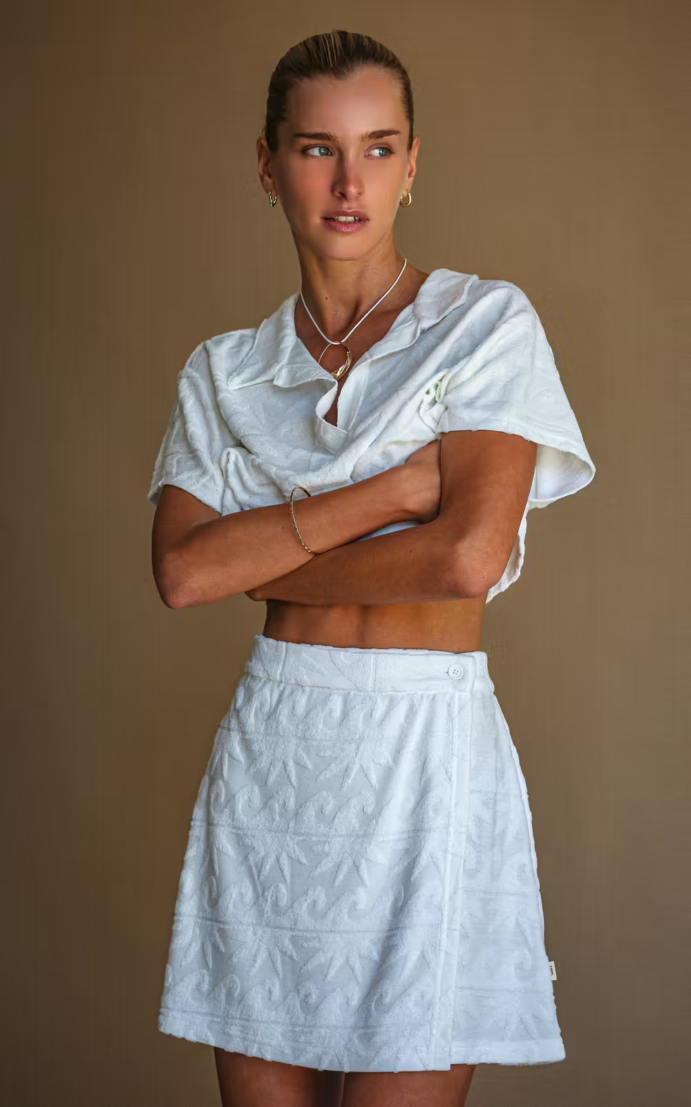 Vanilla terry wrap skirt with subtle embossed pattern, A-line silhouette