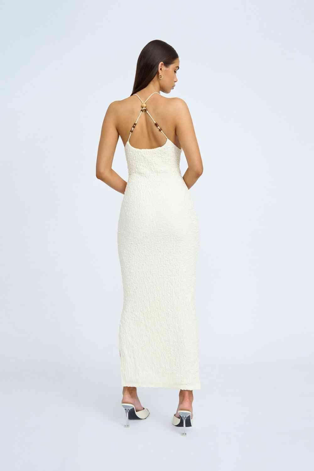Ivory bead midi dress back view with open back and crisscross beaded straps.