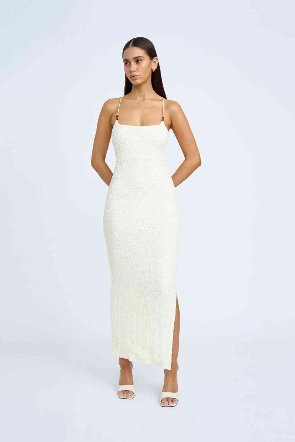 Ivory bead midi dress with spaghetti straps, square neckline, and side slit.