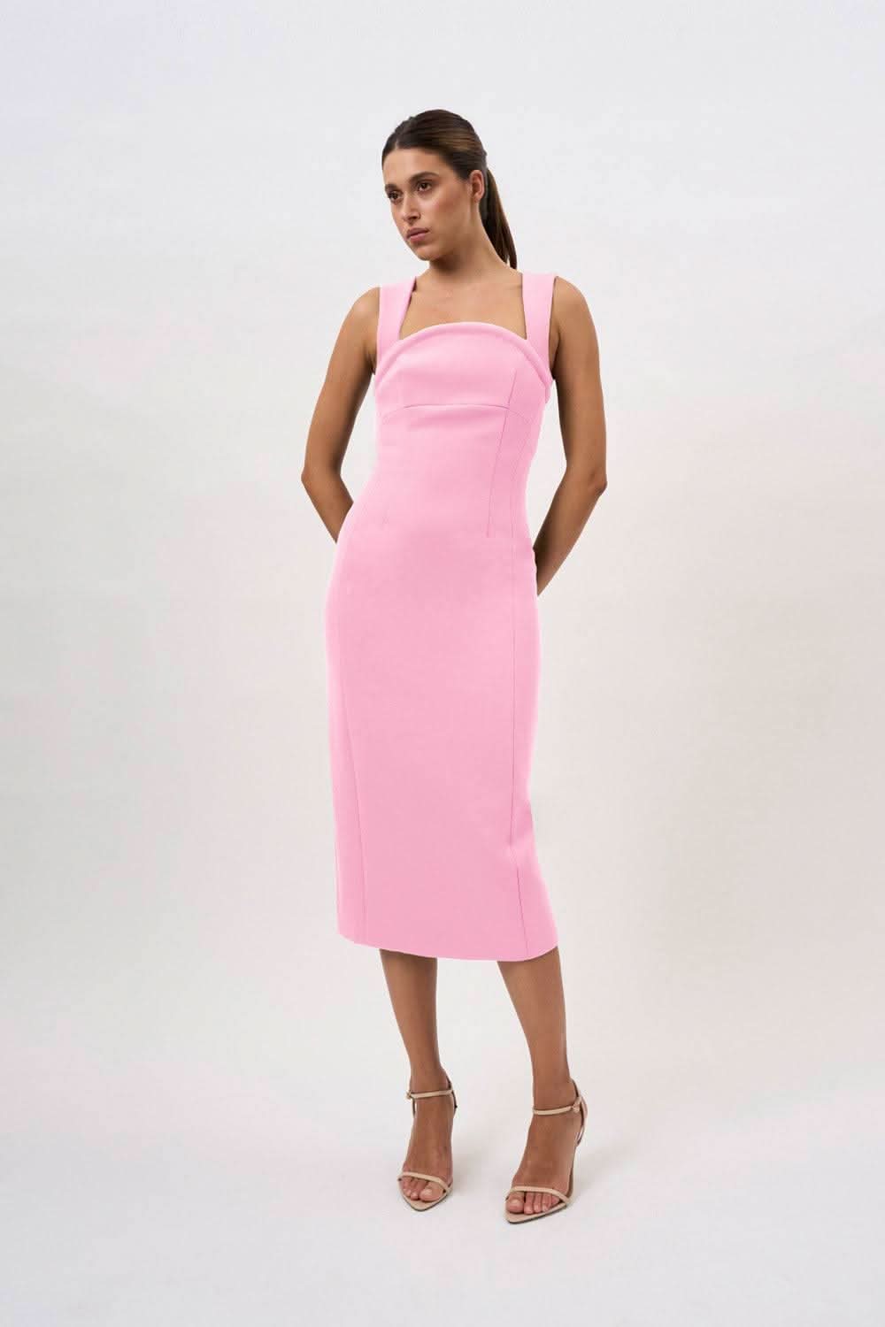 Pink sleeveless midi dress with square neckline and fitted, curving panel seams
