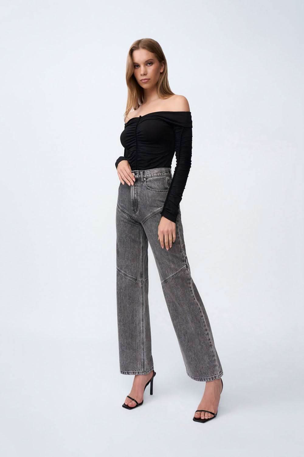 Grey stone-wash high-rise jeans with straight wide-leg silhouette and visible stitching