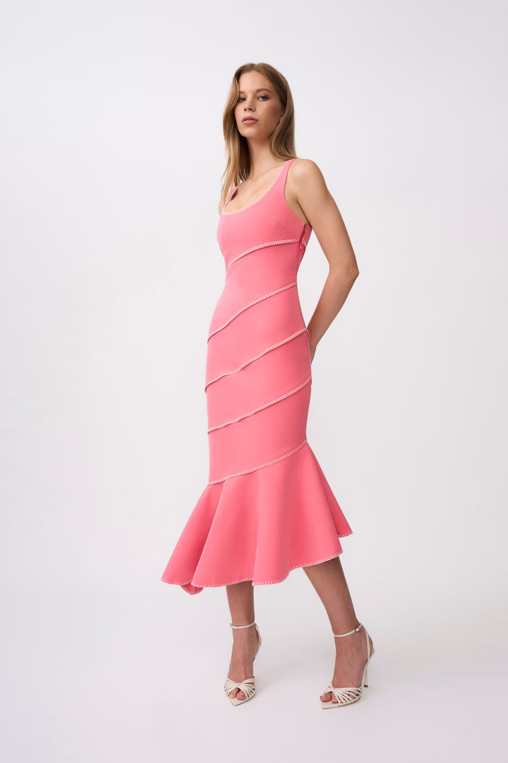 Pink spiral midi dress, sleeveless scoop neck, fitted waist with flared mermaid hem
