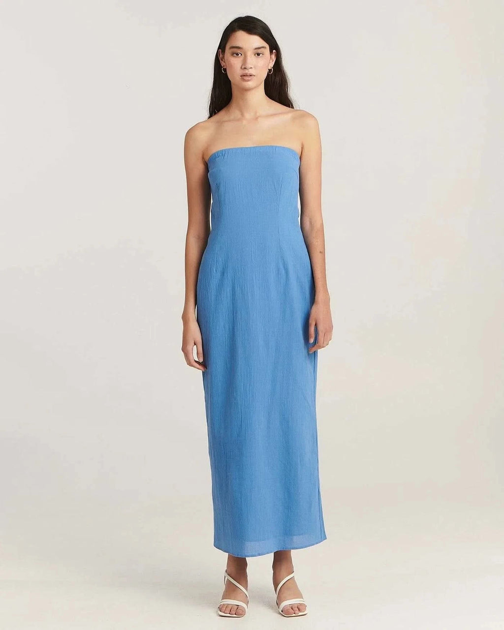 Dusty blue strapless midi dress, straight tube silhouette, full front view