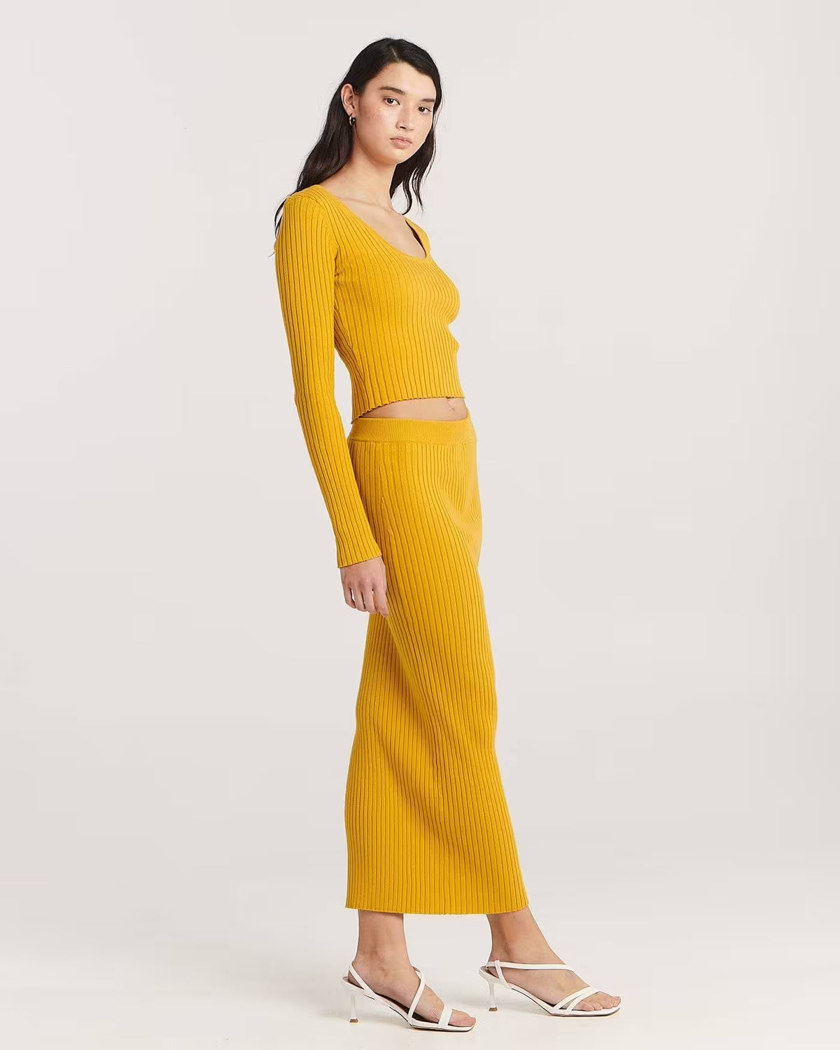 Golden ribbed long-sleeve scoop-neck crop top, side profile