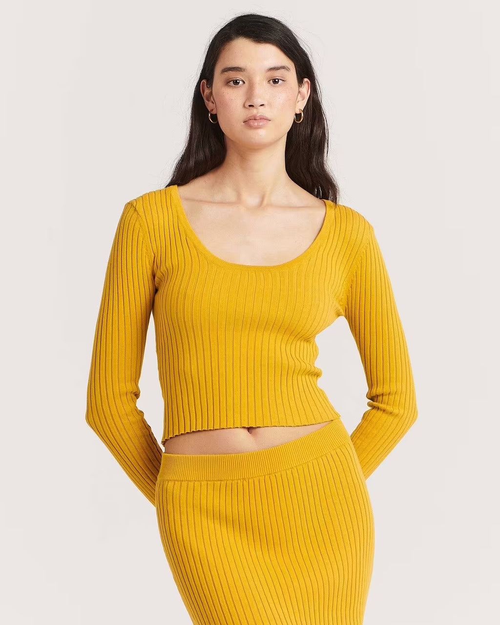 Golden ribbed long-sleeve scoop-neck crop top, front view