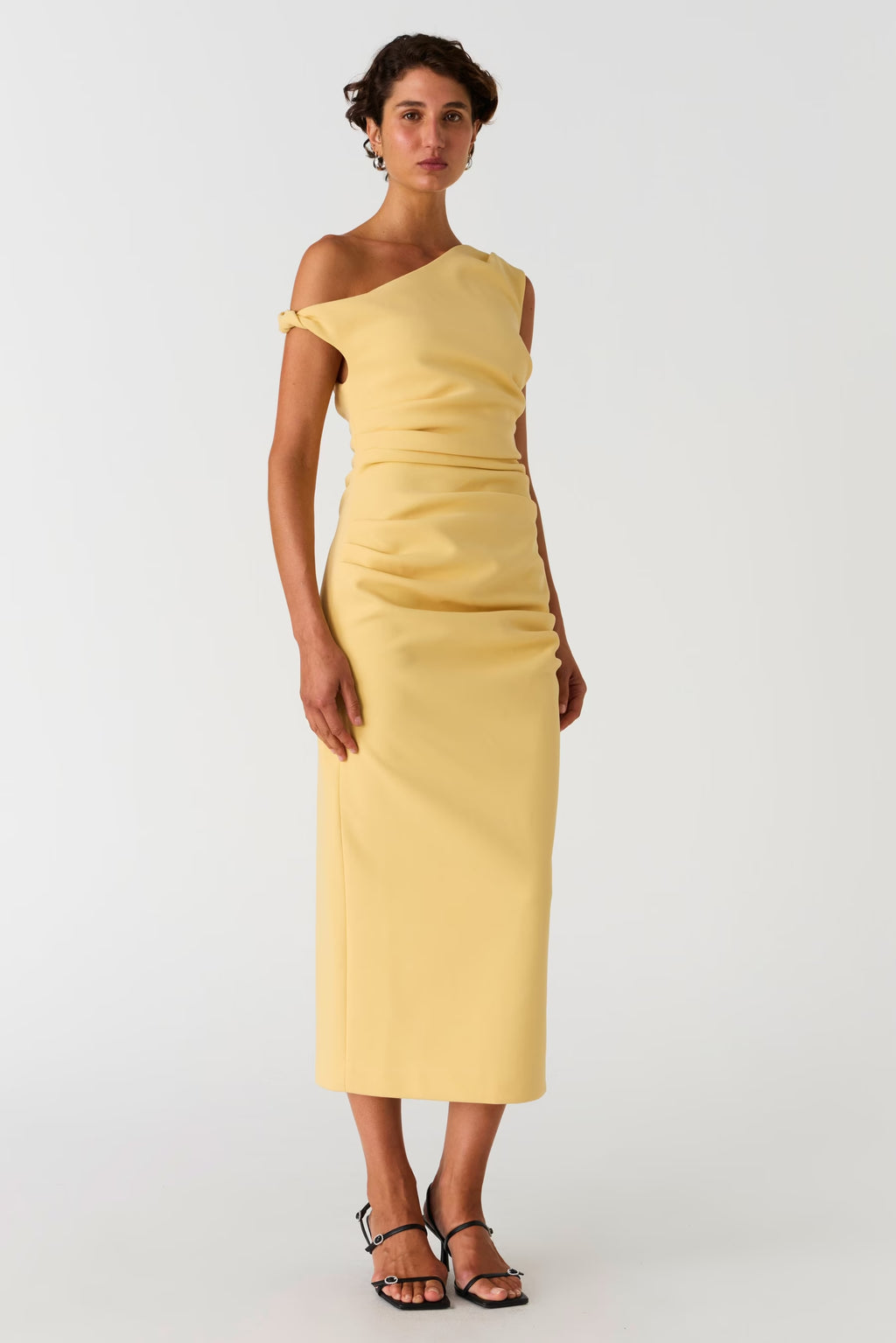 Buttermilk yellow off-shoulder midi dress with ruched waist and fitted silhouette