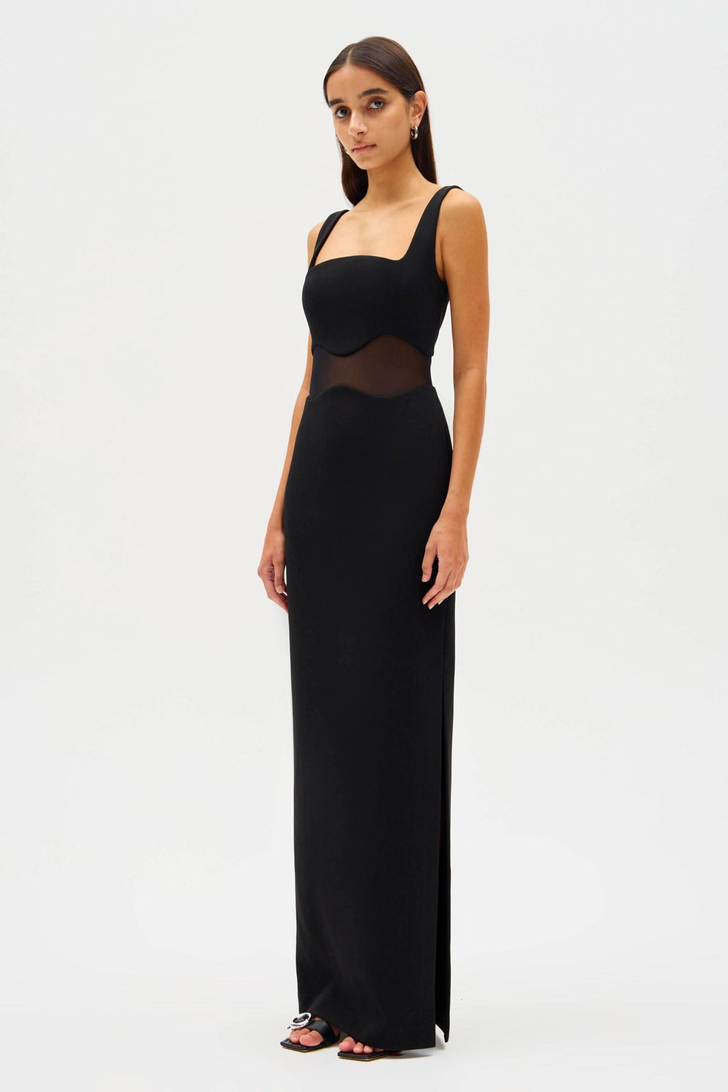 Black sleeveless maxi dress with square neckline and fitted mesh waist panel