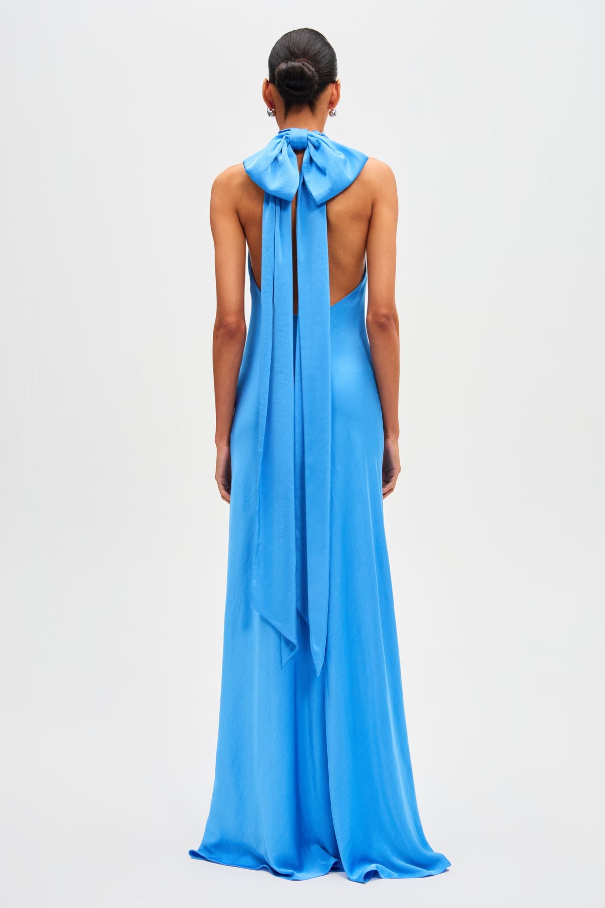 Lapis blue satin halter maxi dress with open back and long tied bow