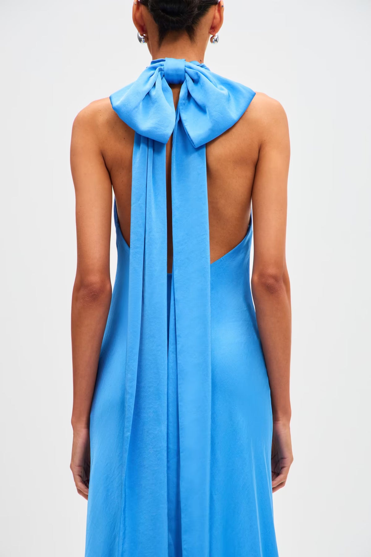 Lapis blue satin halter maxi dress back view with bow and open back
