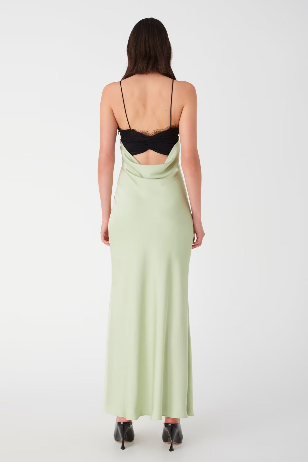 Back view of meadow green maxi dress with black lace halter straps