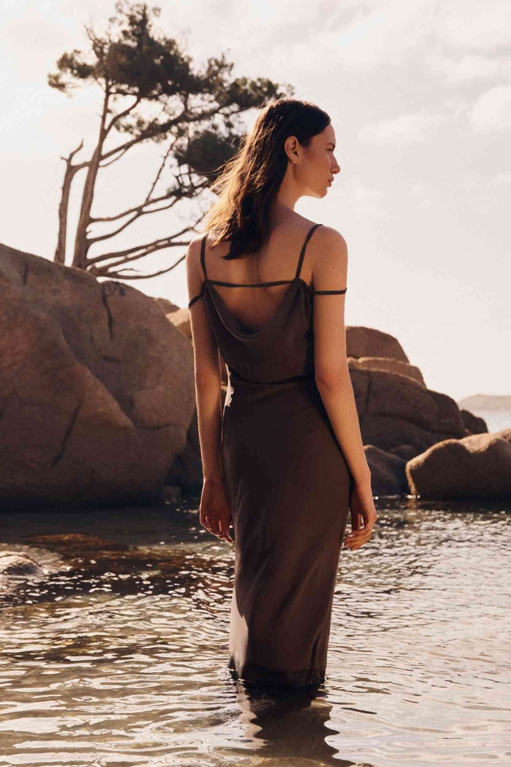 Gull grey maxi dress with spaghetti straps and ruched draped bodice, side view