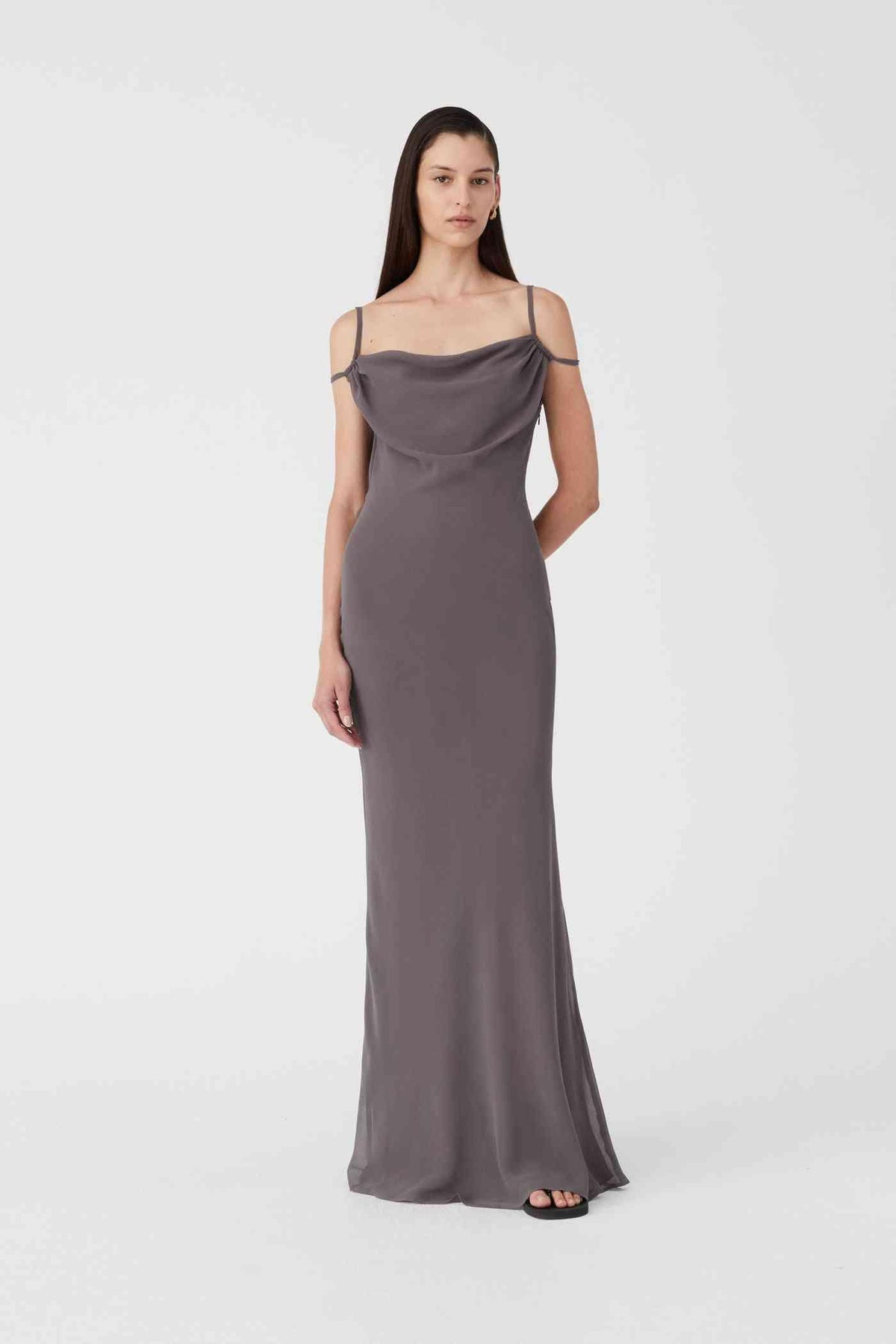 Gull grey maxi dress with cowl neckline and spaghetti straps, front three-quarter view