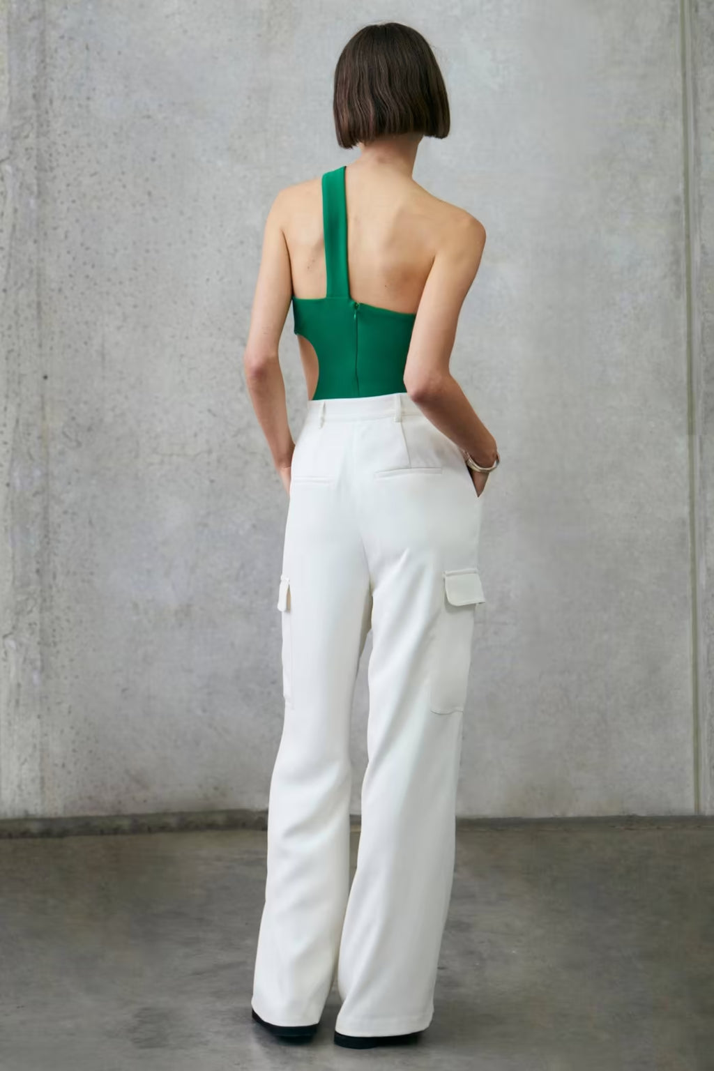 Fern green backless one-shoulder bodysuit with open back, fitted