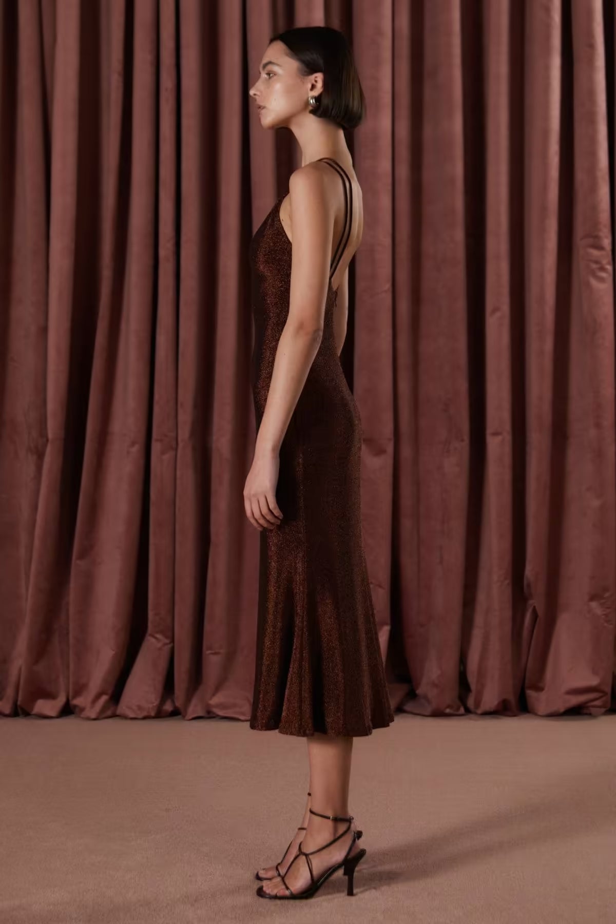 Copper slinky jersey midi dress with spaghetti straps and open crisscross back