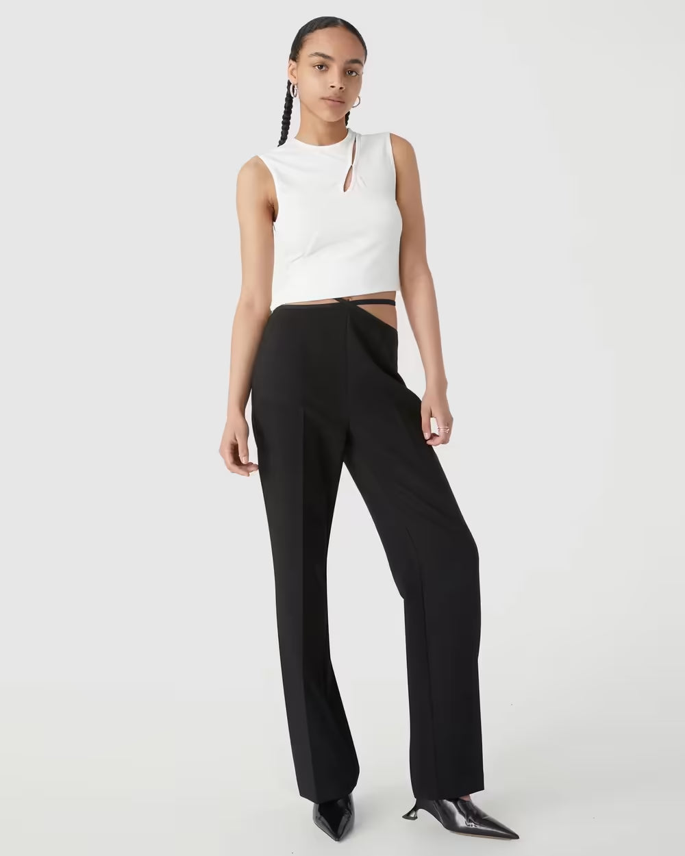 Ivory ribbed jersey tank top with racerback and keyhole neckline cutout, full body