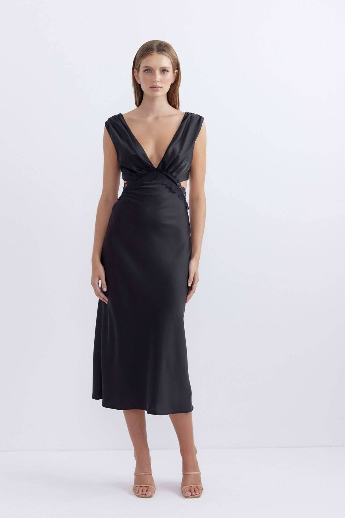 Black satin midi dress with twisted V-neck and fitted skirt, sleeveless.