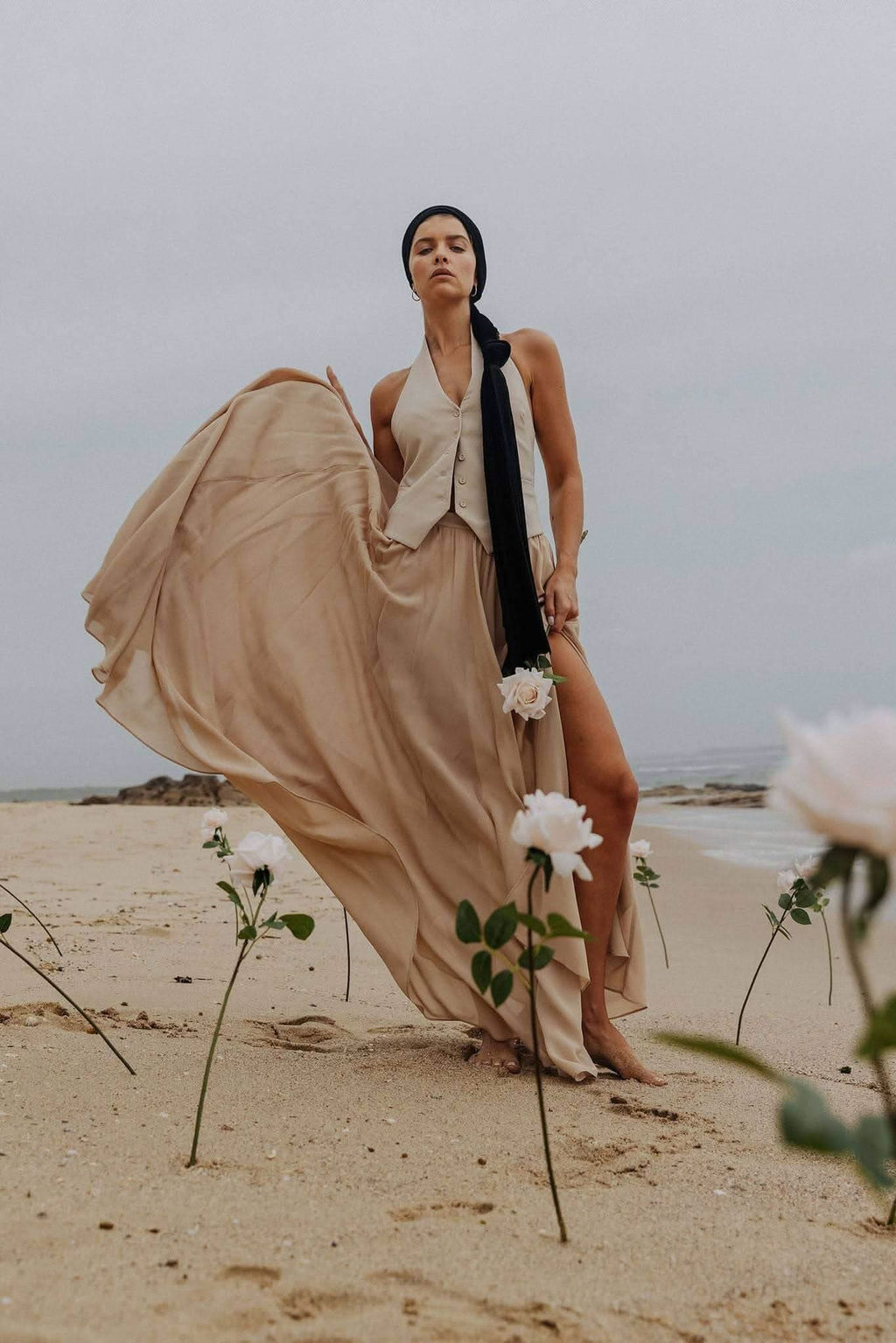 Stone halter vest with V neckline and draped back panel detail, sleeveless