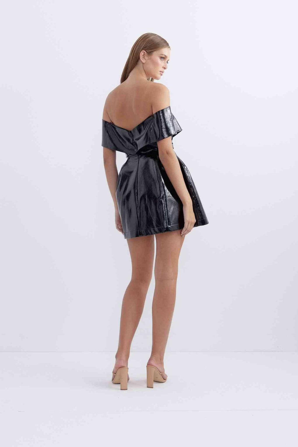 Black metallic off-shoulder mini dress with draped back and gathered skirt