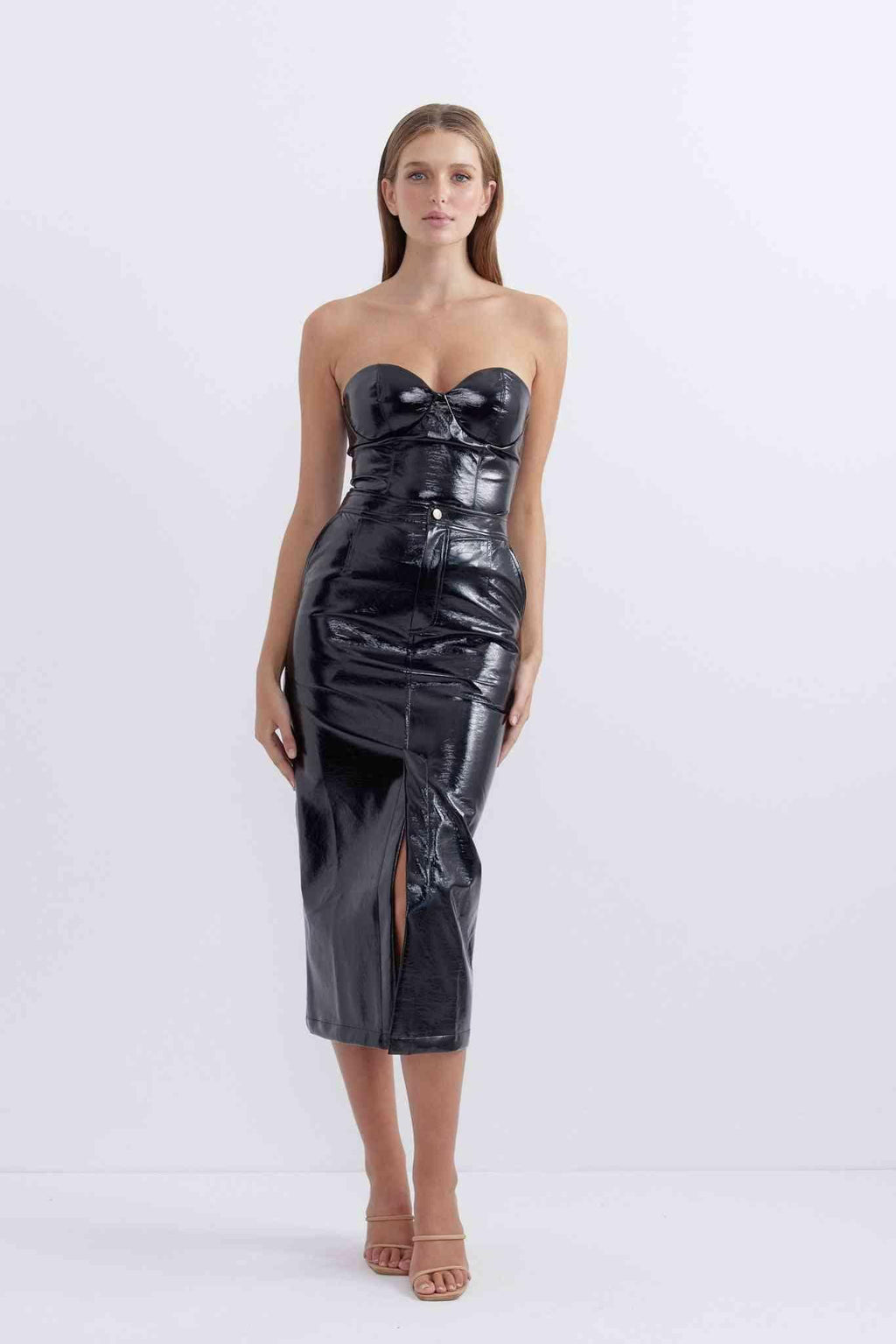 Glossy patent black midi skirt with structured front panels and front slit