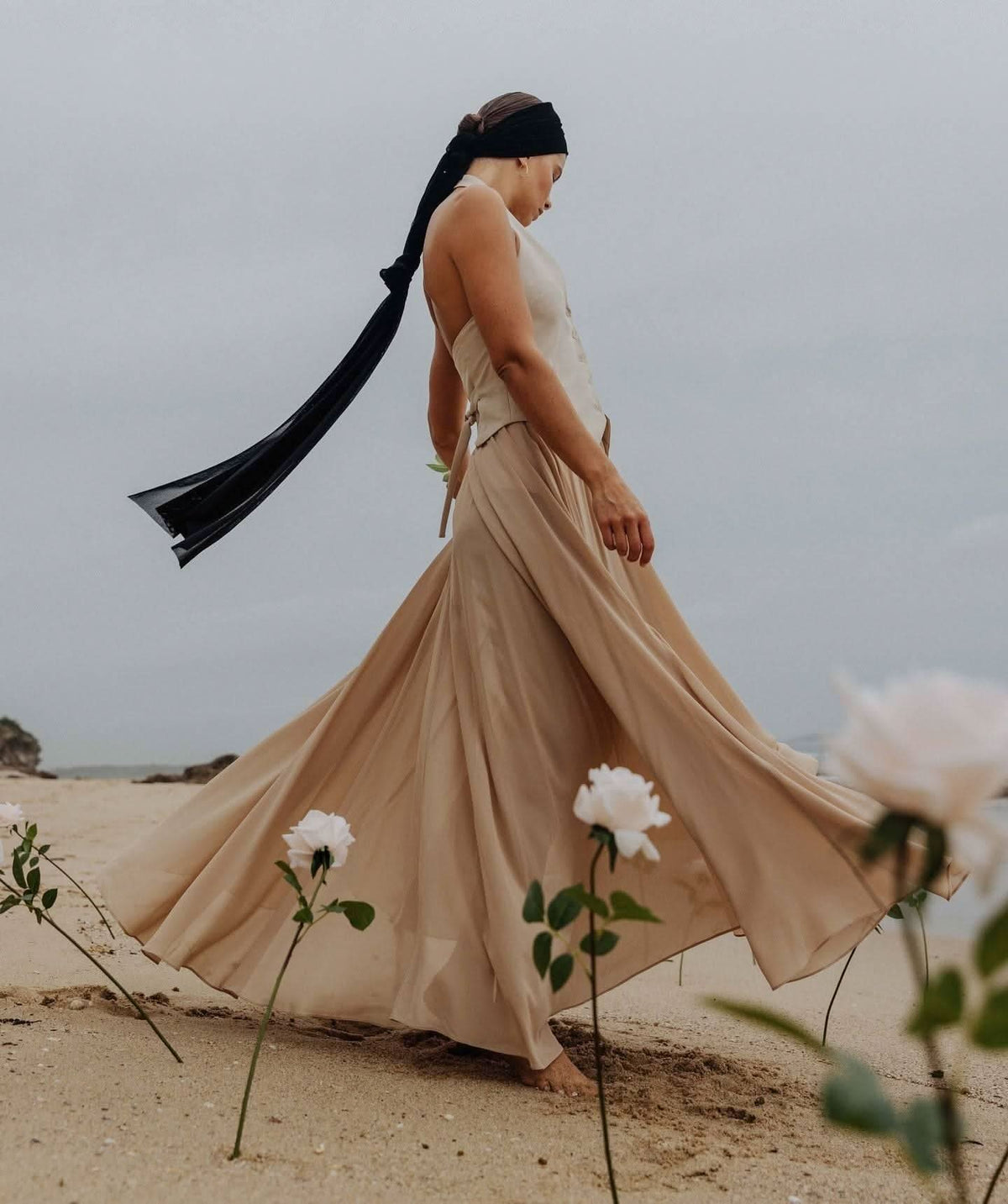 Stone pleated maxi skirt with wide swing and layered, airy drape