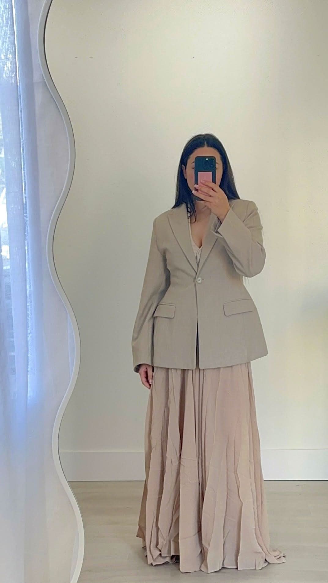 Stone long skirt with layered drape and soft pleats for a relaxed fit