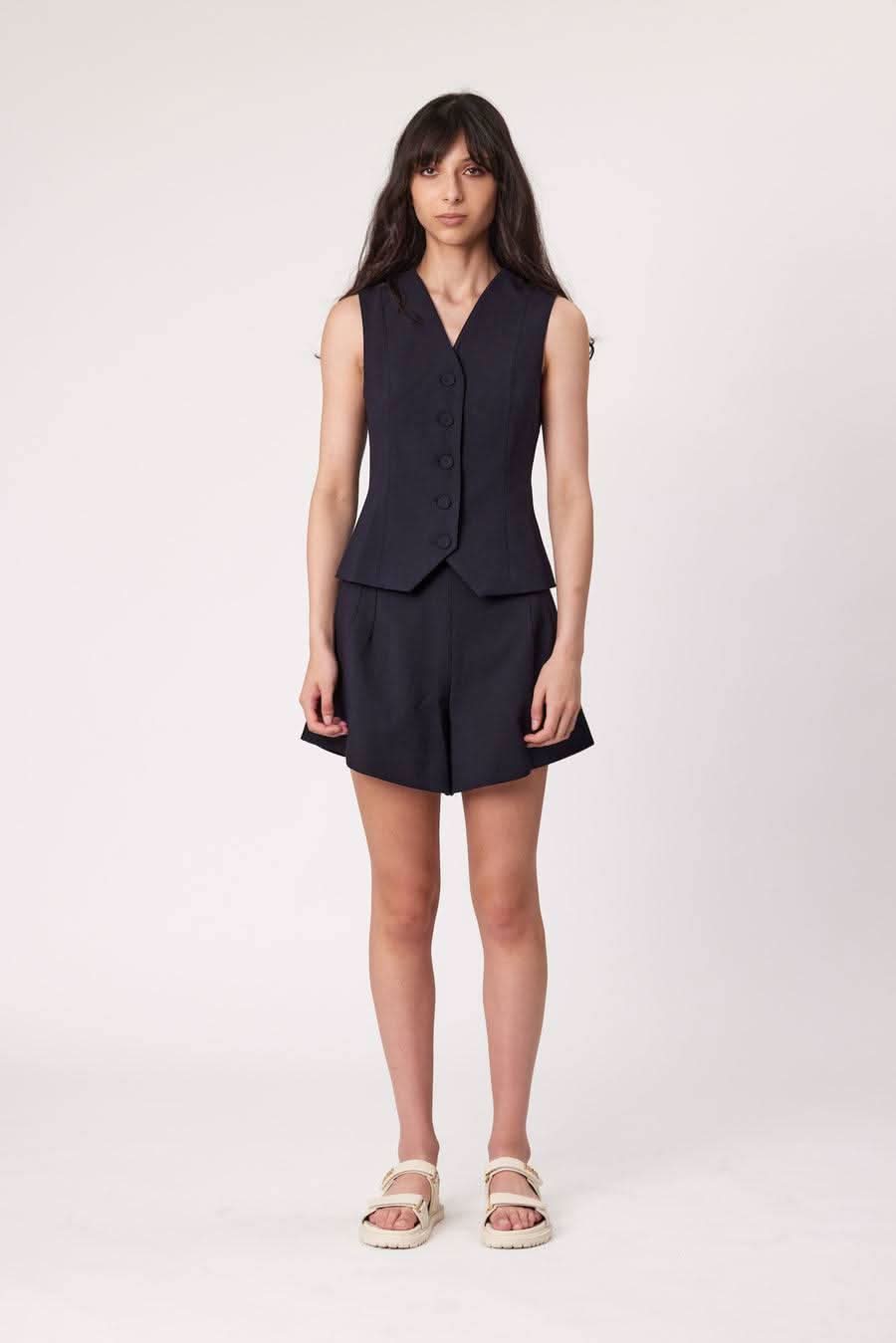 Dark vest and matching tailored shorts set with cuffed hem