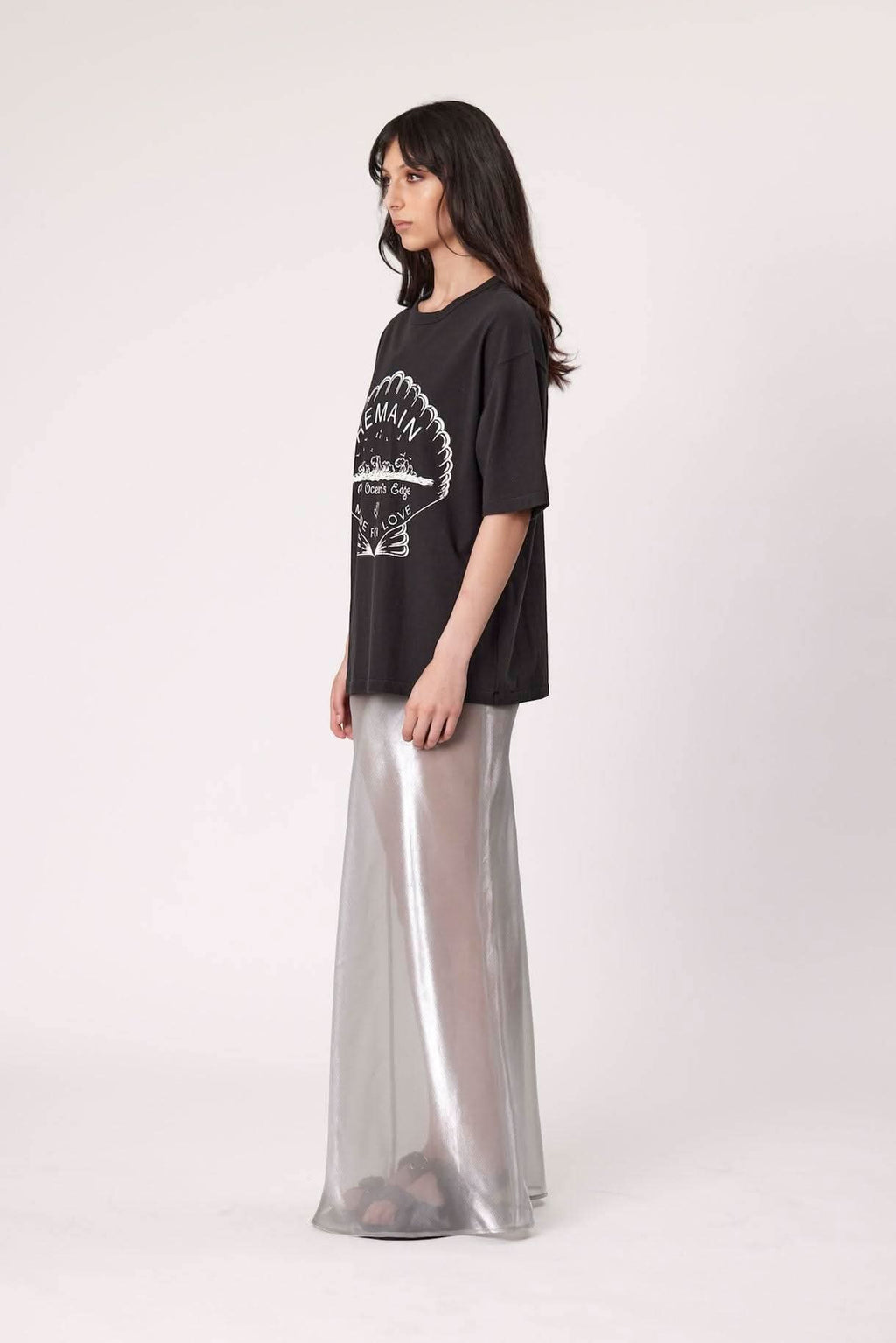 Washed black graphic tee with front emblem print and short sleeves