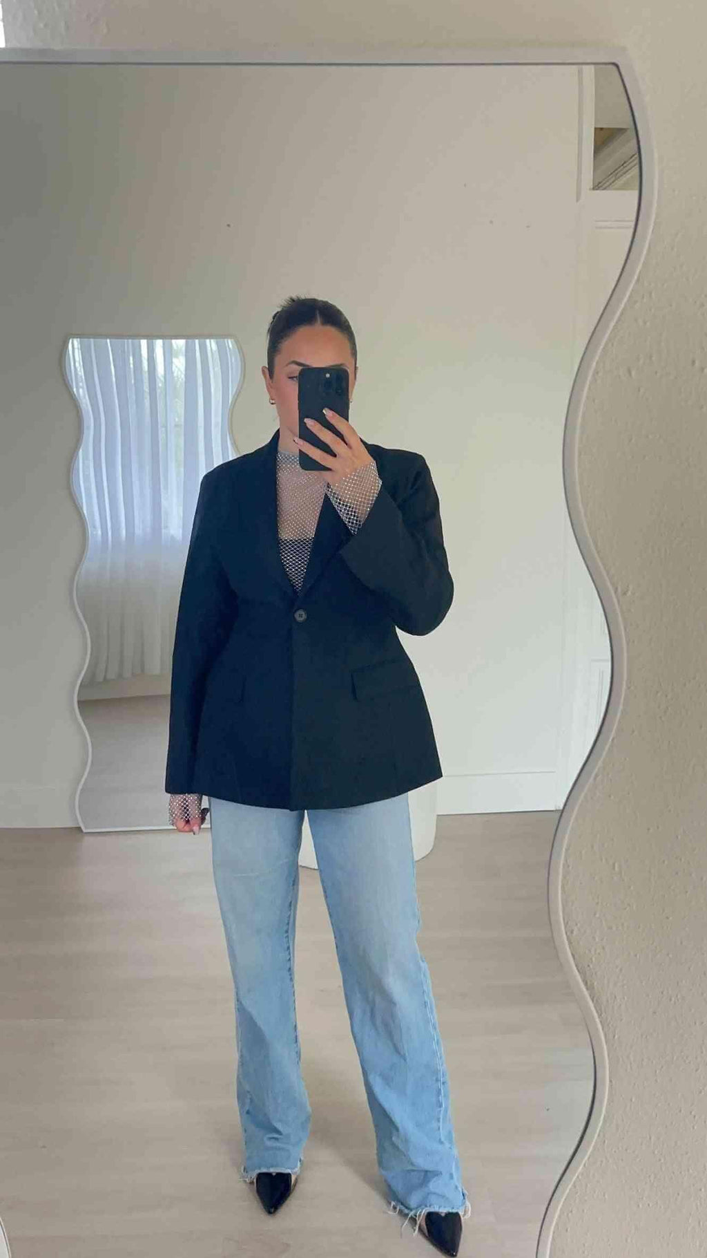 Sofia blazer with notch lapels and single-breasted front, shown in mirror selfie
