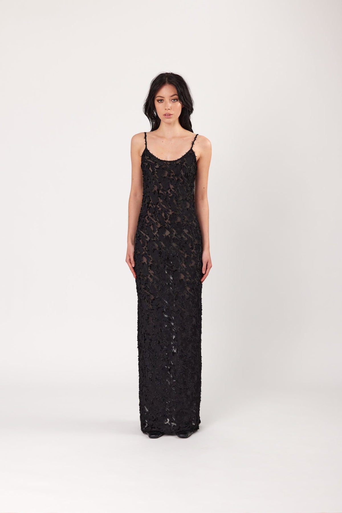 Black lace slip dress with spaghetti straps, sleeveless maxi length, fitted silhouette