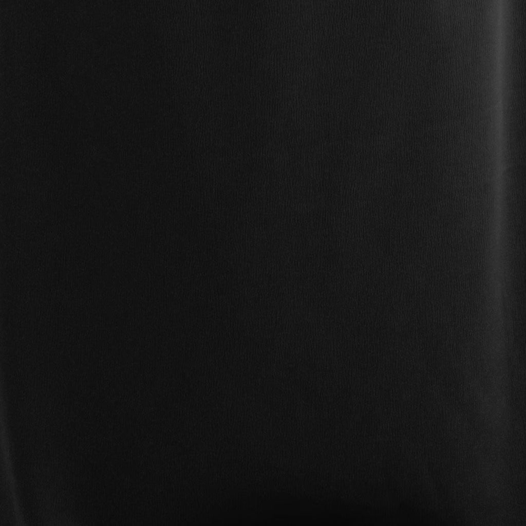 Black satin-like fabric close-up with smooth woven texture