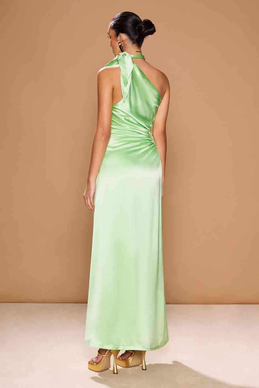 Light green halter-back maxi dress with draped ruching and a long front slit.