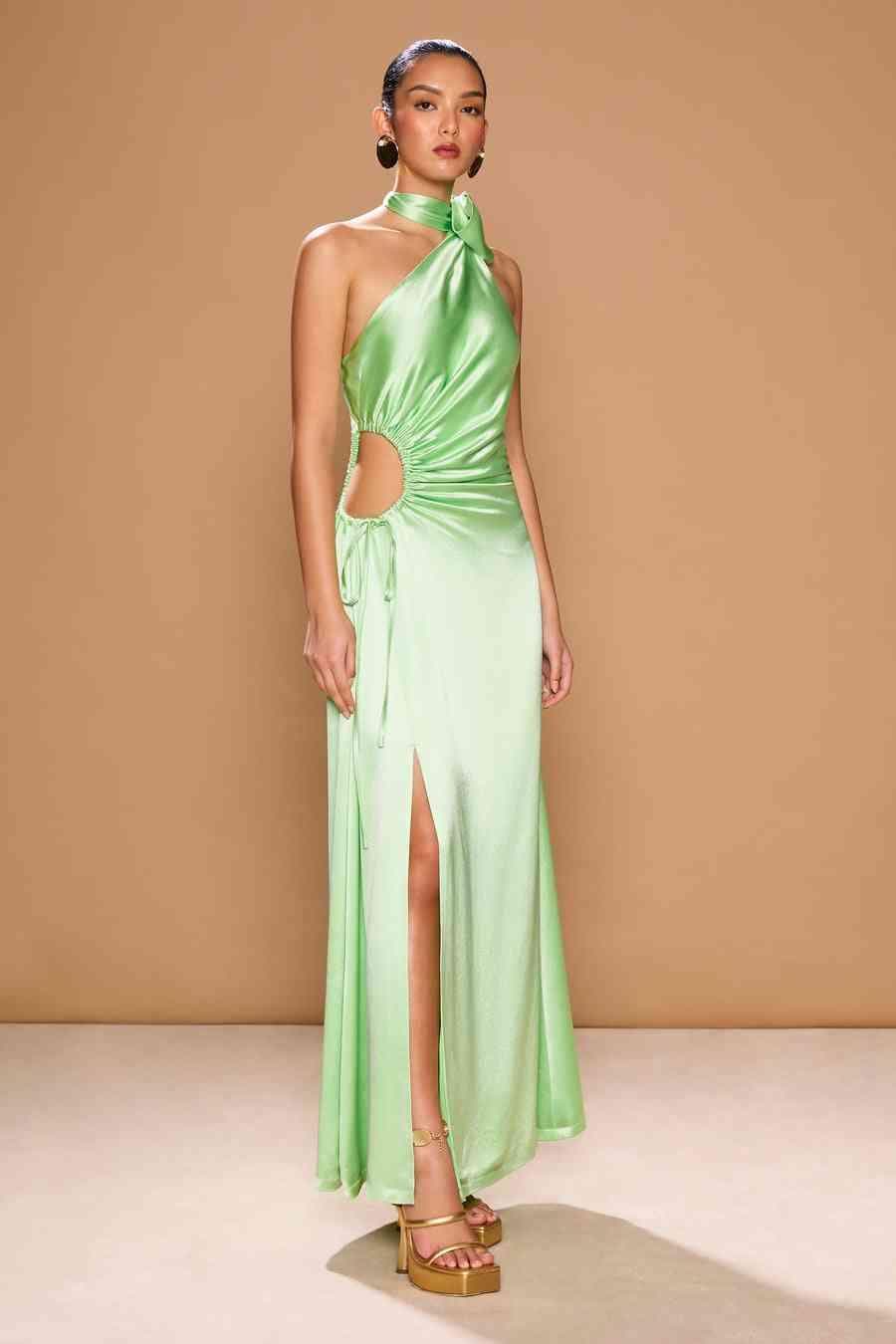 Light green satin halter maxi dress with ruched neckline and center cutout.