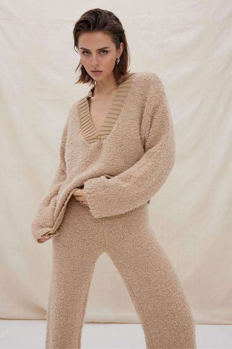 Mink knit pant with slim-to-wide drape and ribbed waistband, full length