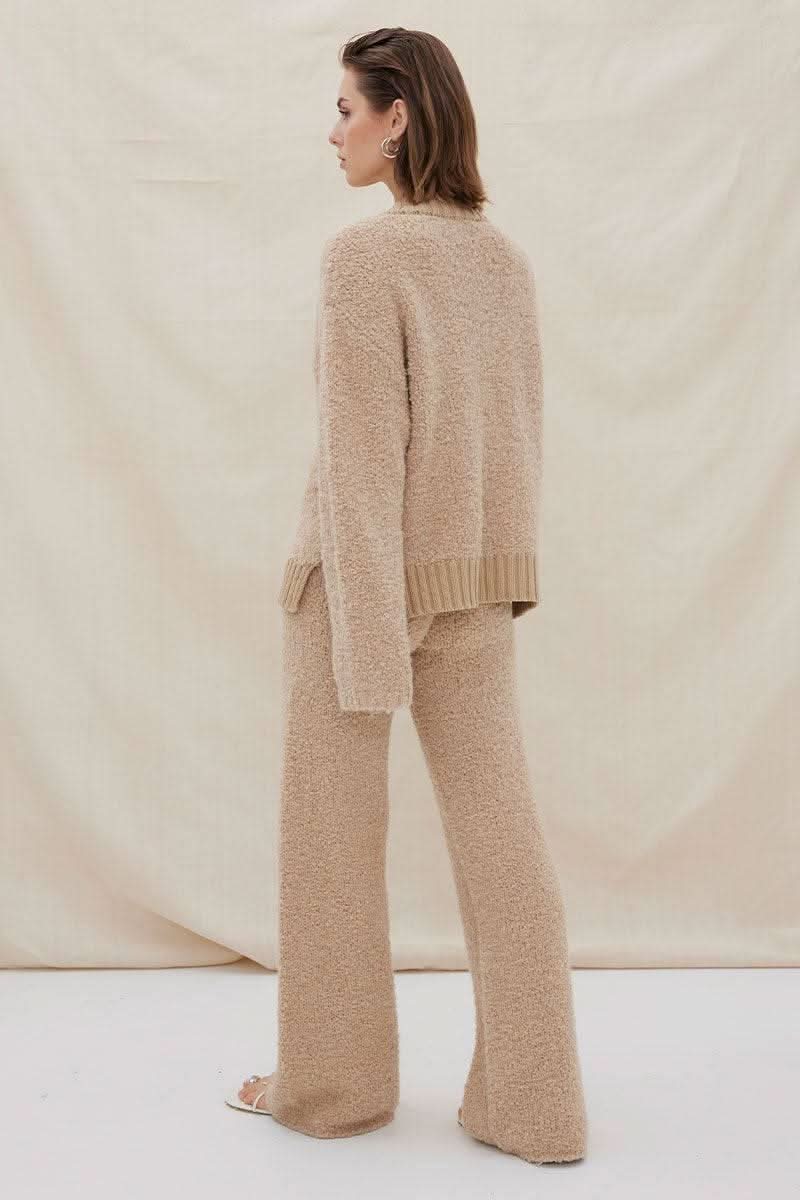 Mink knit lounge pants in side view with relaxed wide leg and ribbed waist