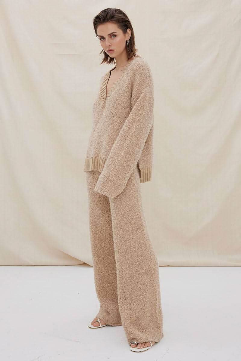 Mink V-neck knit sweater with matching wide-leg knit pants, side view