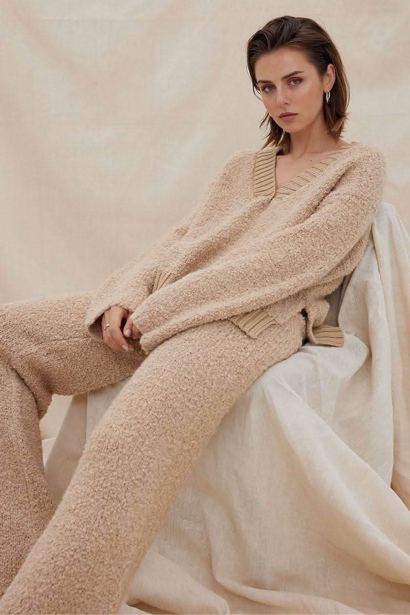 Mink V-neck knit sweater with wide-leg knit pants, relaxed cuffs