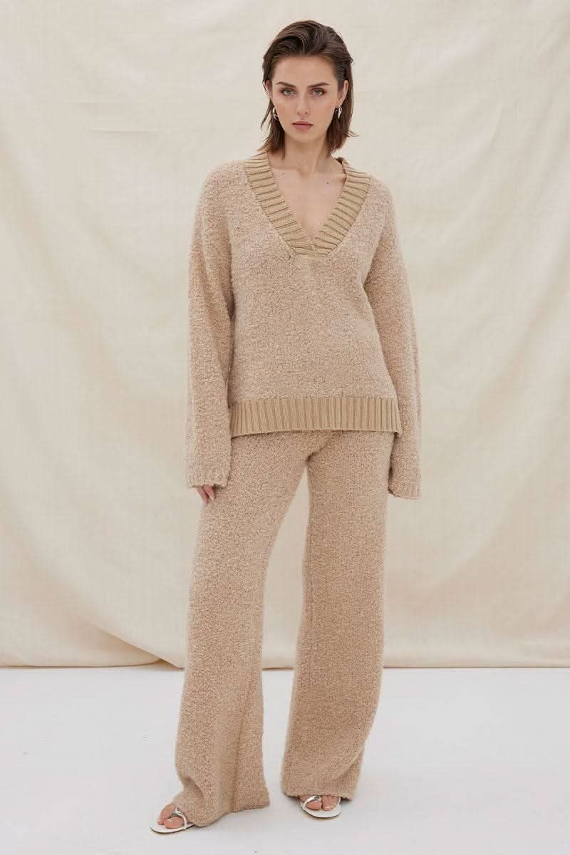 Mink V-neck knit sweater and wide-leg knit pants, ribbed waistband and cuffs