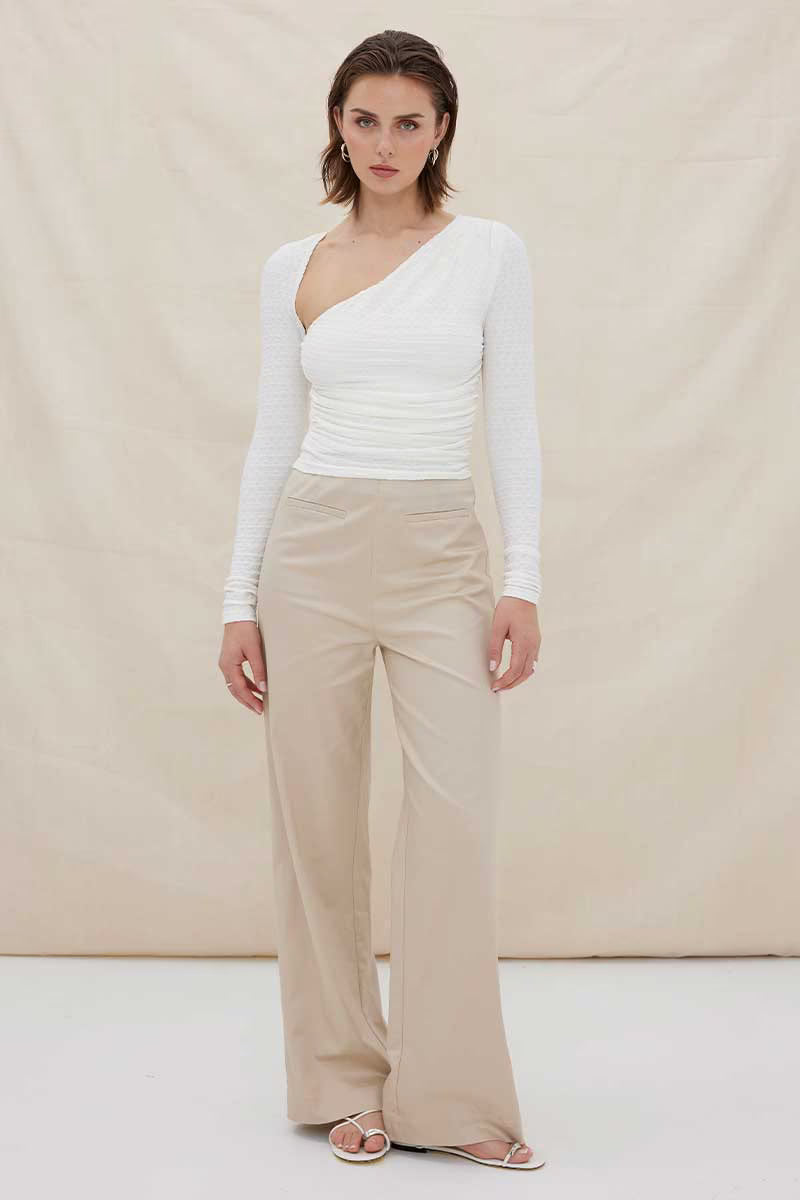 White one-shoulder ruched long-sleeve top with asymmetrical neckline